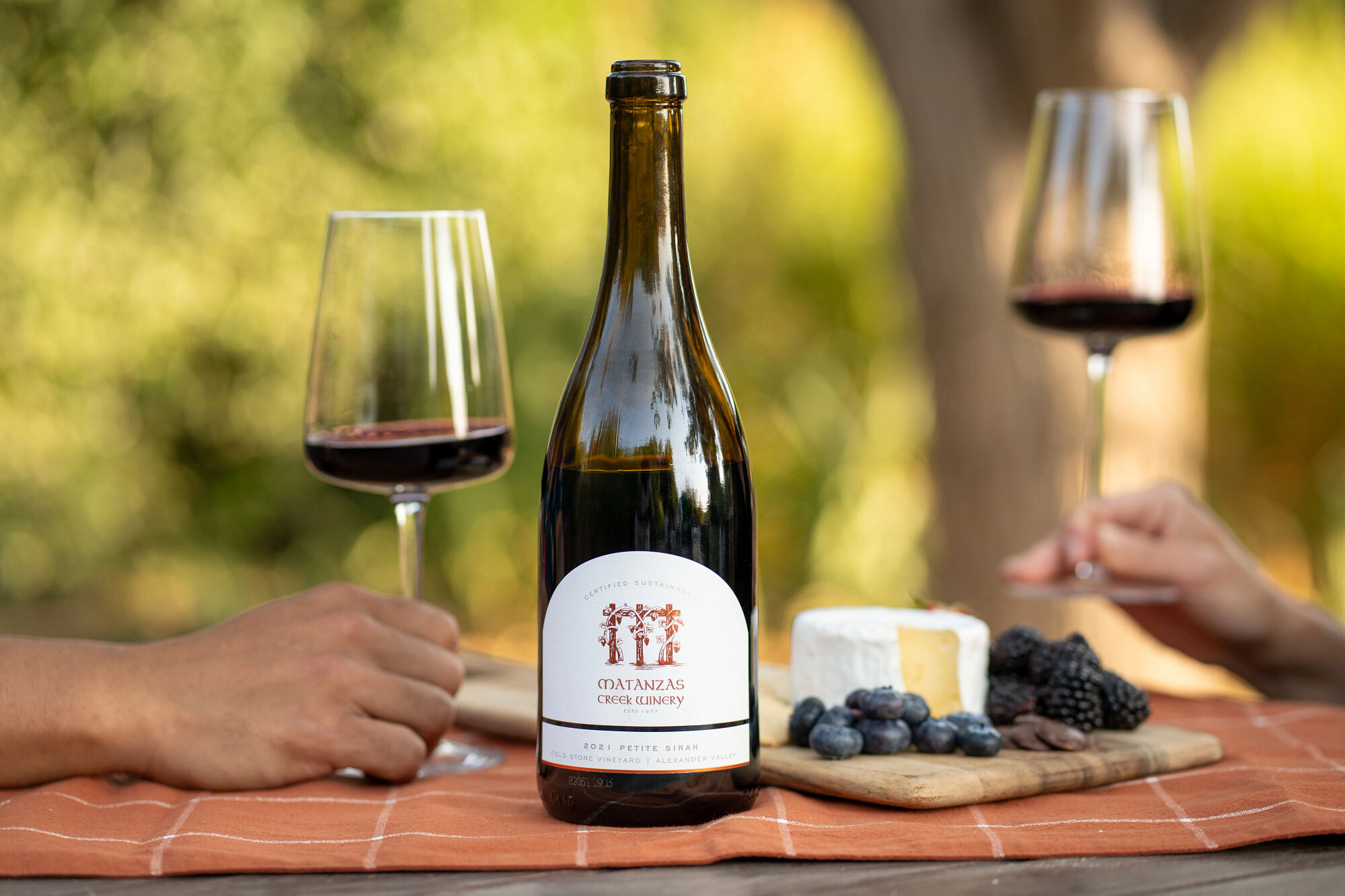 Matanzas Creek Red Wine bottle and glass of wine